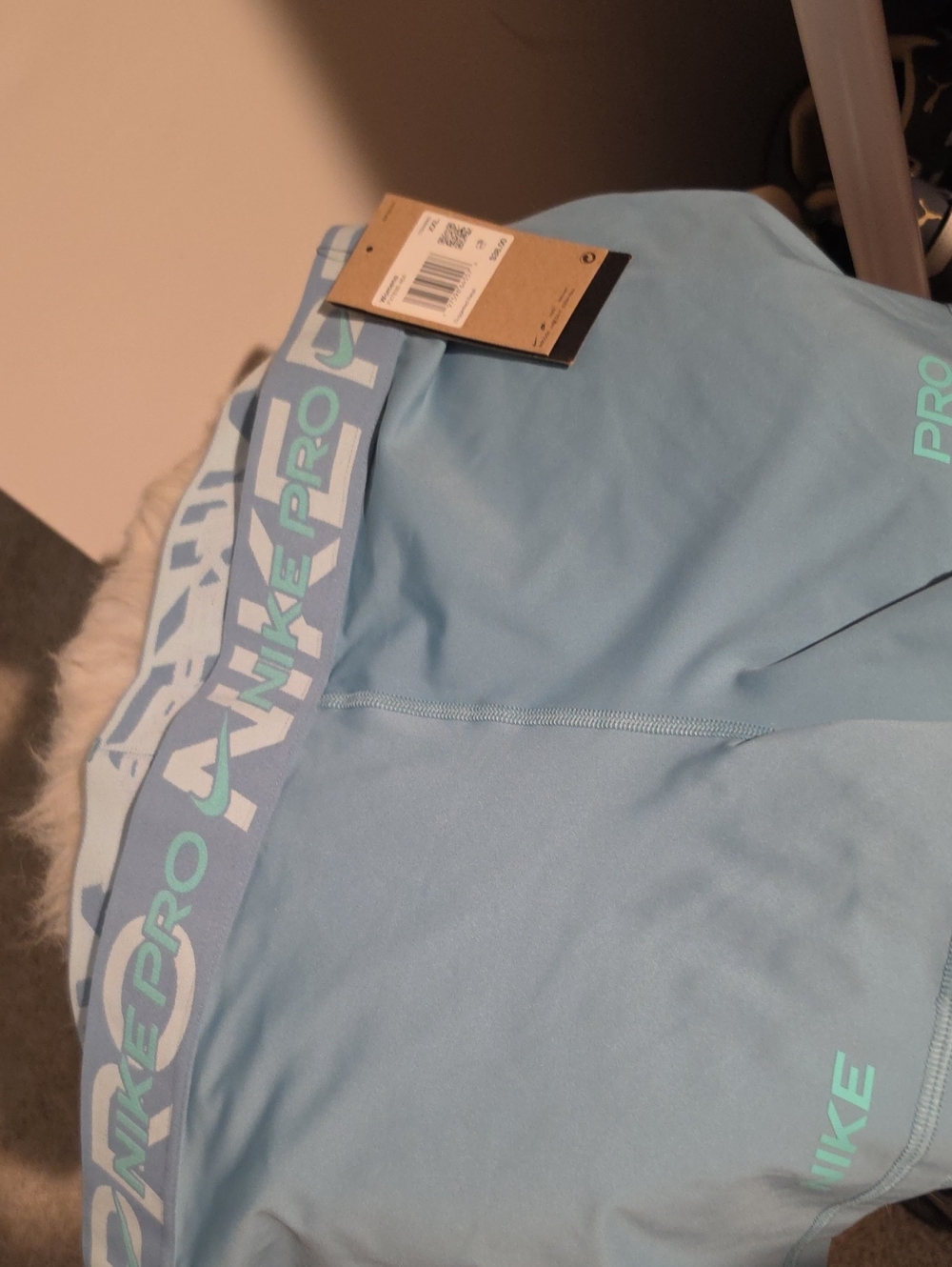 Nike Light Blue Compression Shorts with Mint Logo